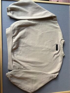 Essentials Beige Sweatshirt with Black Embossed Tag